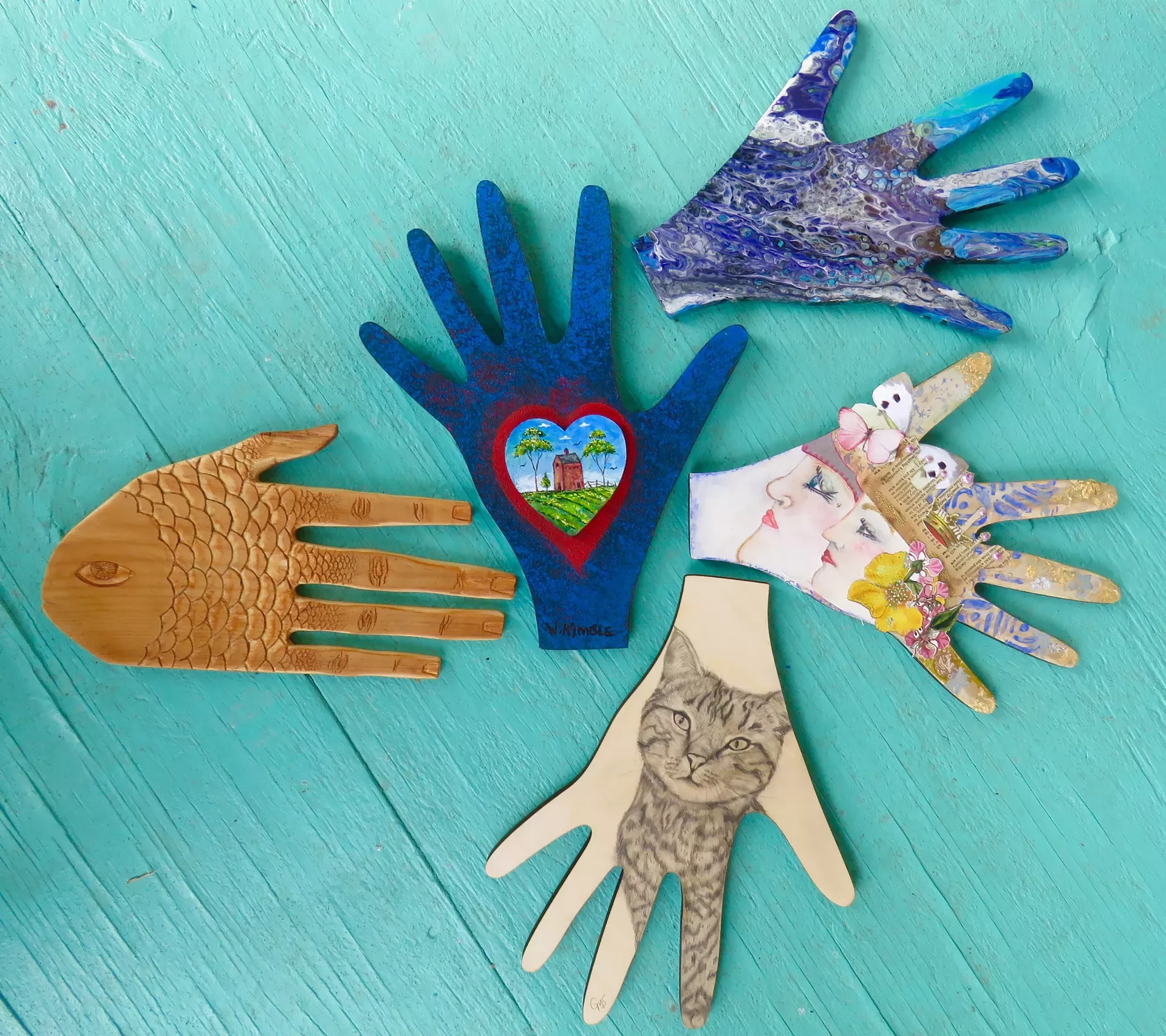 Artist hands, clockwise from left: Erik Rehman, Warren Kimble, Terry Zigmund, Kate Cahill Vansuch and Gail Seaver