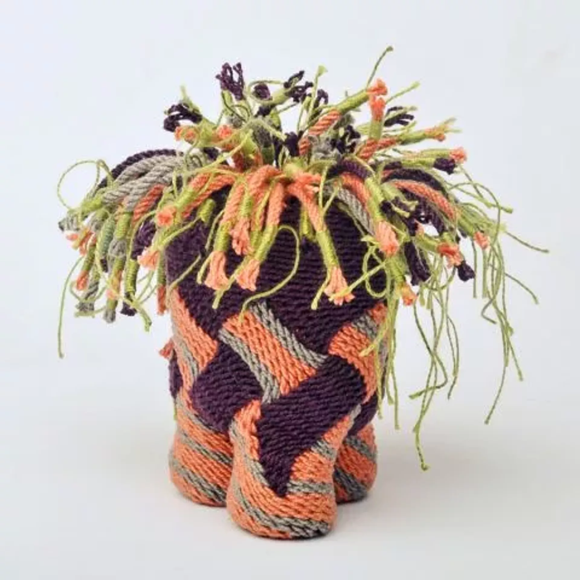 Woven fiber basket by Rebecca Jensen