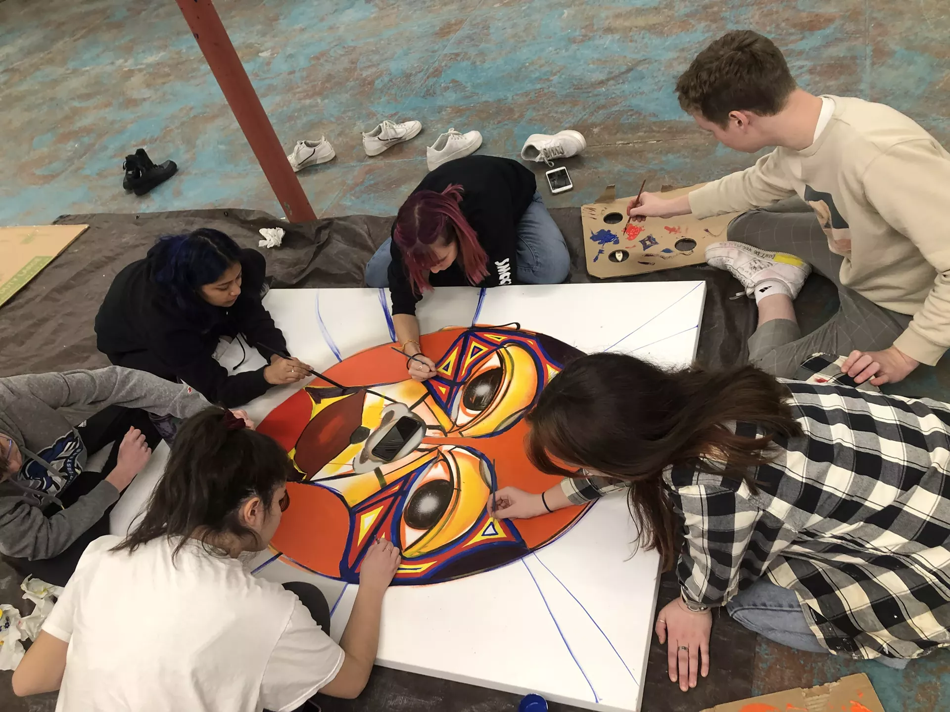 Burlington City & Lake students working on a painting