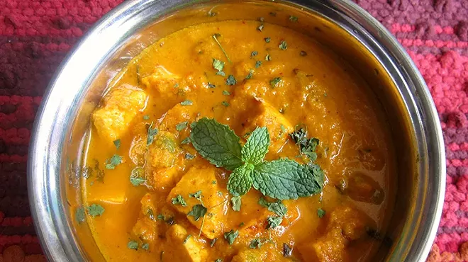 Image: A Mosaic of Flavor: Congolese Muamba Nsusu & Ugali