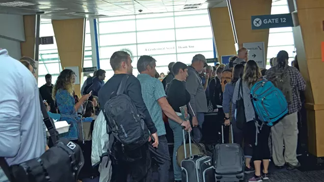 Image: Long Lines, Missed Flights: Airport Rush Hour Prompts Reconfiguration of TSA Access