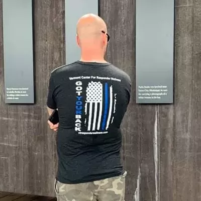 Image: Photo of Burlington Cop's T-Shirt at Lynching Memorial Triggers Criticism
