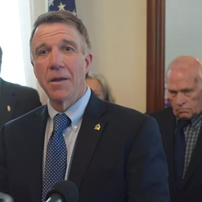 Image: Scott Signs Bill Limiting Trump&rsquo;s Immigration Executive Orders