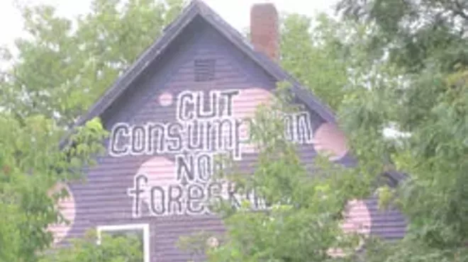 Image: WTF: Why does a Burlington house tell passers-by to "cut consumption, not foreskin?"
