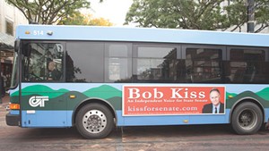 A Bob Kiss for State Senate advertisement on a bus