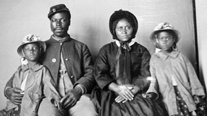 African American soldier and family