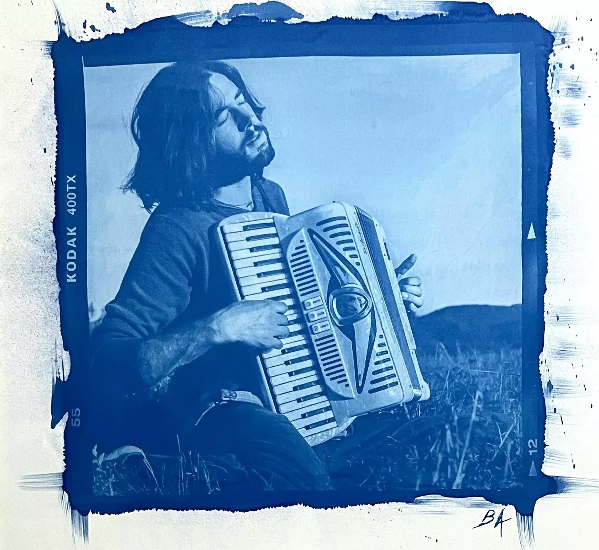 "Greg in the Pageant Field, Bread & Puppet, 2008" by Benjamin Aleshire