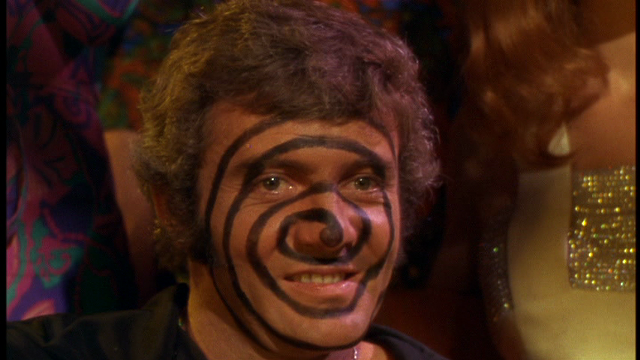 Because spiral face-paint is, like, so freaky, man. - WARNER BROS. PICTURES
