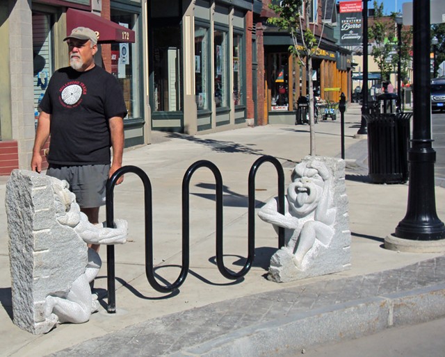 Calais sculptor Chris Miller on Main Street with the sculptural bike rack he created - COURTESY OF SUE HIGBY