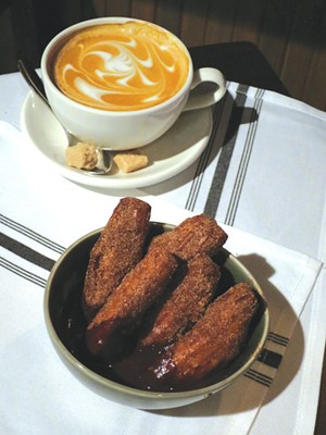Cappuccino and churros - MATTHEW THORSEN