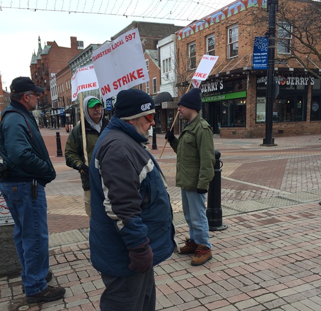Chittenden County Transportation Authority bus drivers picketing at Church and Cherry streets Friday - MARK DAVIS