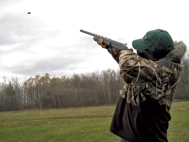 Courtney Copp takes aim at a clay pigeon - ETHAN DE SEIFE