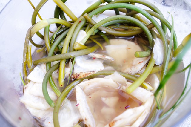 Garlic scapes and celery root hot-brined pickles. - HANNAH PALMER EGAN