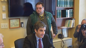 Burlington Mayor Miro Weinberger urges the House Government Operations Committee on Thursday to pass three gun restrictions that city voters backed.