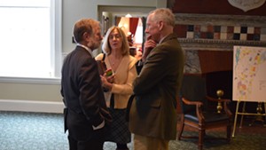 House Education Committee Chair Dave Sharpe (D-Bristol), left, talks with Vermont National Education Association  president Martha Allen and general counsel Jeff Fannon.