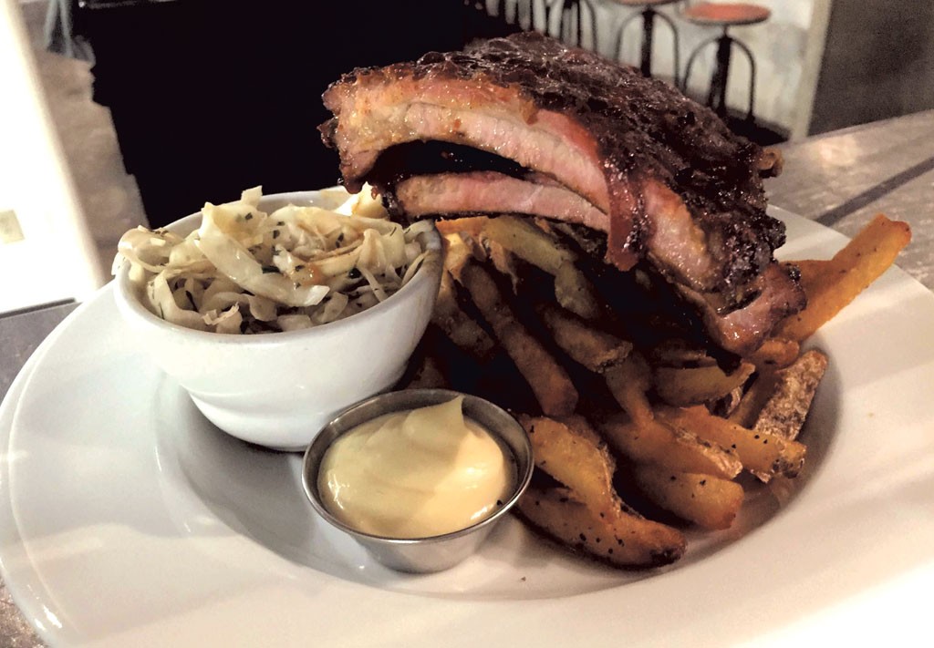 House-smoked baby back ribs - COURTESY OF NEWPORT CIDERHOUSE BAR &amp; GRILL