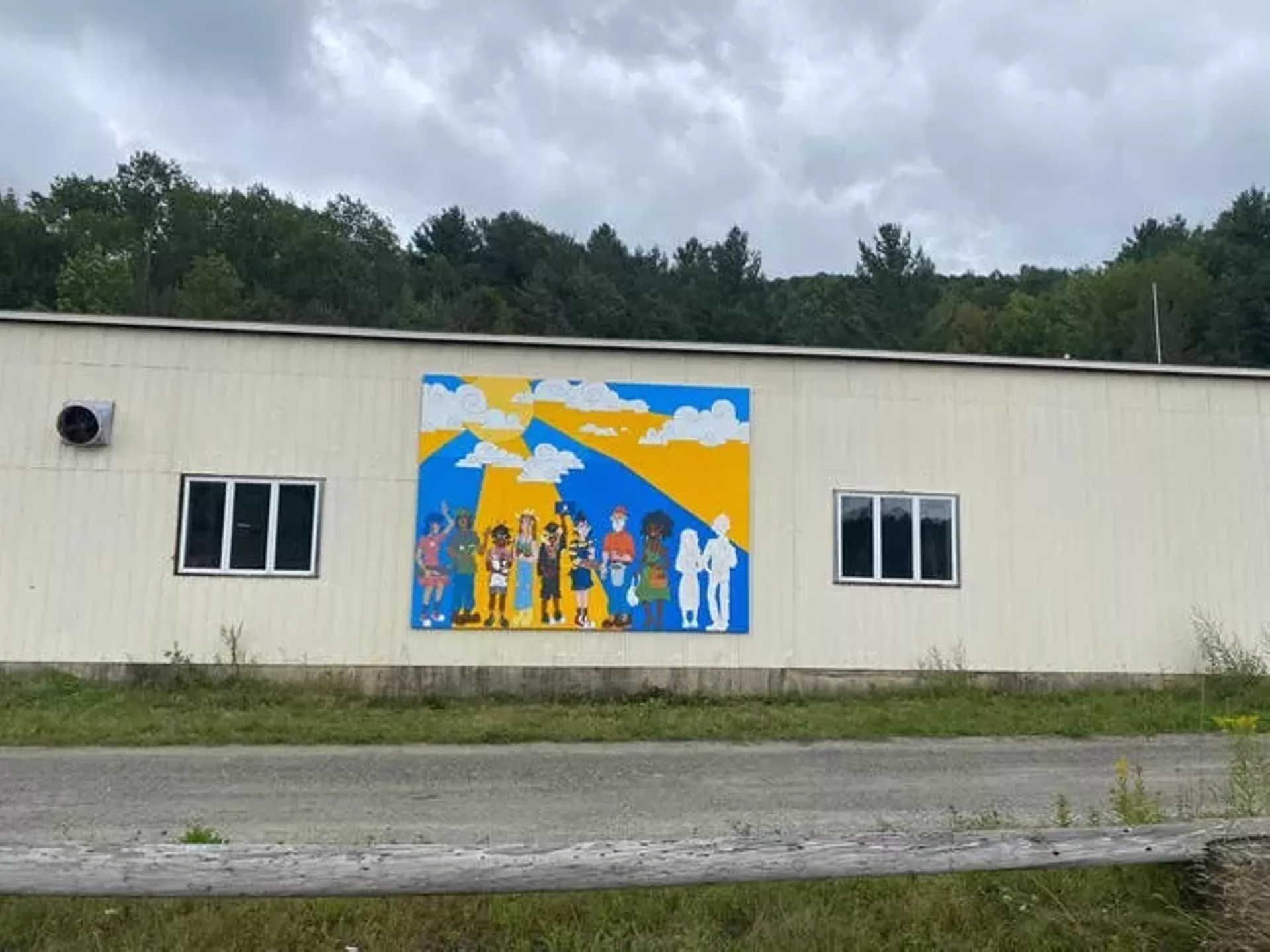 "Humans of Johnson" mural by Finn Watsula
