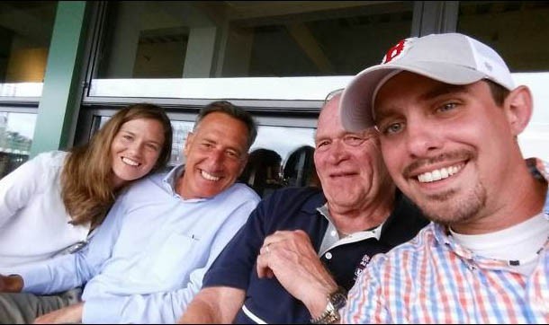 In this photo from Sen. Dick Sears' Facebook page, Katie Hunt, Gov. Peter Shumlin, Sears and John Murphy take in a Red Sox game at Fenway Park. - COURTESY: VTDIGGER