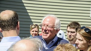 Sen. Bernie Sanders speaking to attendees at a campaign house party in Manchester, N.H.