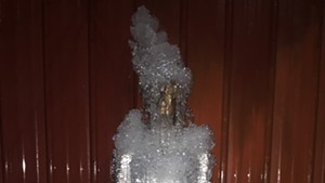 Mannequin coated in ice