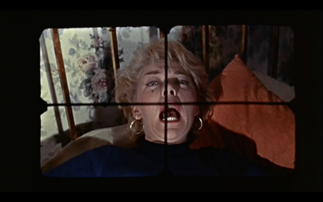 Mark's first victim — as seen from his / his camera's / Michael Powell's / our point of view — in Peeping Tom - ANGLO-AMALGAMATED FILM DISTRIBUTORS
