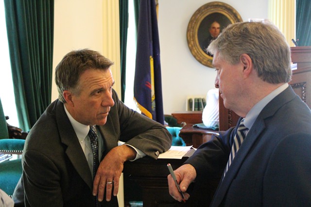 Lt. Gov. Phil Scott and Senate President Pro Tem John Campbell confer Thursday in the Senate. - PAUL HEINTZ