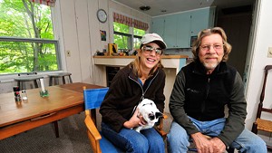 Moretown flood victims Rebecca Sykes and Gary Butler at their temporary home in a Fayston vacation rental.