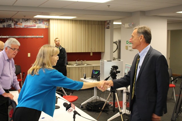 Nancy Remsen shakes Gov. Peter Shumlin's hand at last month's Burlington Free Press gubernatorial debate. - PAUL HEINTZ