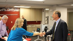 Nancy Remsen shakes Gov. Peter Shumlin's hand at last month's Burlington Free Press gubernatorial debate.