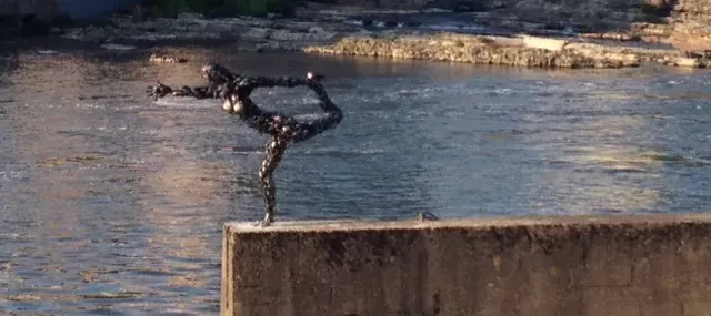 A Metal "Dancer" Poses on the Winooski River