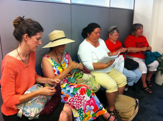 Rebecca Foster, Jane Palmer, Maren Vasatka, Claire Broughton and Mary Martin stage a "knit-in" at Vermont Gas headquarters in South Burlington. - KATHRYN FLAGG
