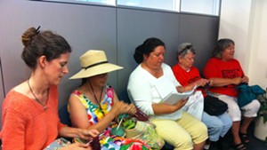 Rebecca Foster, Jane Palmer, Maren Vasatka, Claire Broughton and Mary Martin stage a "knit-in" at Vermont Gas headquarters in South Burlington.