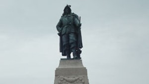Samuel de Champlain with crouching indian