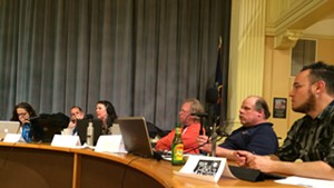 School board members in City Hall on Thursday