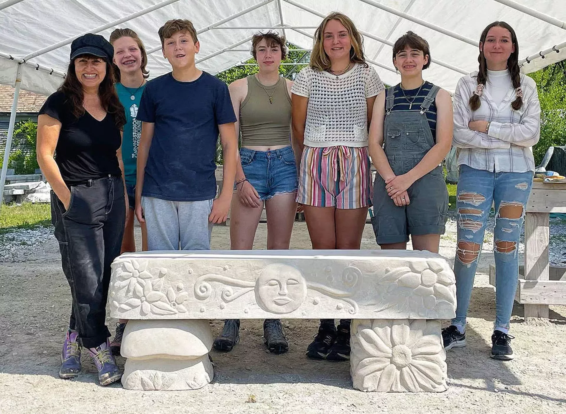Nora Valdez and stone bench artists