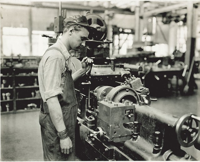 Factory worker operating a lathe - COURTESY OF AMERICAN PRECISION MUSEUM