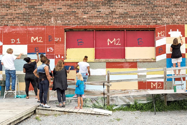 King Street Center and community volunteers painting the Moran Plant with Clark Derbes in 2015 - OLIVER PARINI