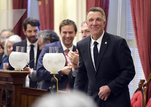 Gov. Phil Scott surrounded by lawmakers at his State of the State address earlier this month - FILE: JEB WALLACE-BRODEUR