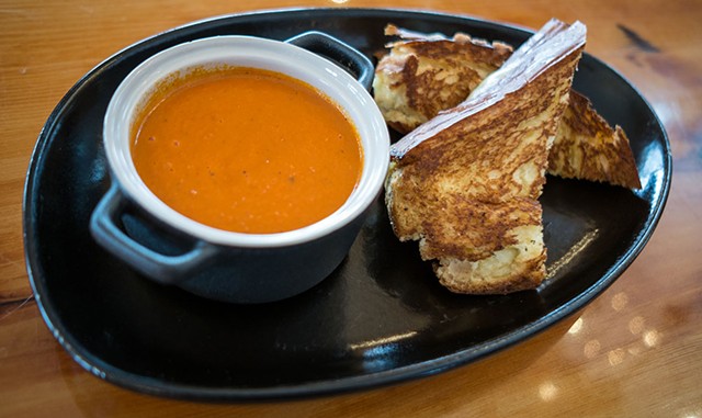 Tomato soup and grilled cheese sandwich at the Mid-Mountain Cabin at the Hermitage Club in Wilmington - ZACHARY P. STEPHENS