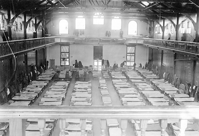The University of Vermont gymnasium as a temporary infirmary during the 1918 Spanish influenza pandemic - COURTESY OF UNIVERSITY OF VERMONT SPECIAL COLLECTIONS, BAILEY/HOWE LIBRARY