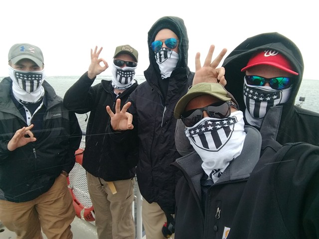 Patriot Front members take a boat trip.