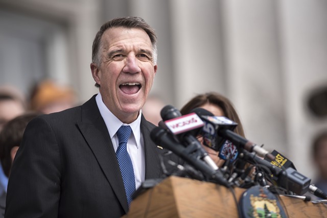 Gov. Phil Scott delivers remarks at Wednesday's bill signing outside the Statehouse. - JOSH KUCKENS