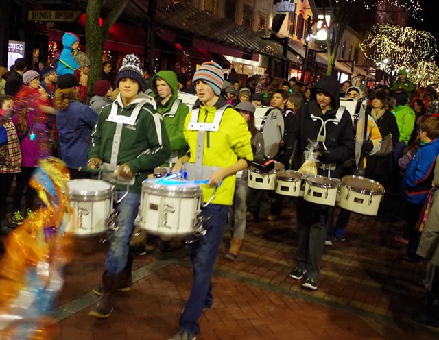 Drum Corps parading on Church Street during First Night Burlington - COURTESY OF STEVE MEASE