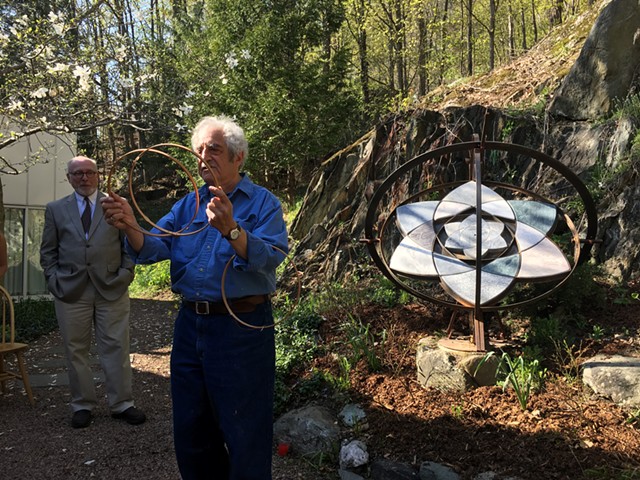 Paul Calter, right, with his sculpture "Trillium" as  state curator David Schütz looks on. - JOHN WALTERS