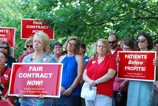 Union members and supporters at a press conference Monday morning announcing the strike notice - SARA TABIN