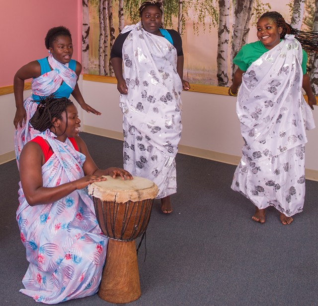 Aline Mukiza (with drum) and Burundian dancers - COURTESY OF JEFF WOODWARD