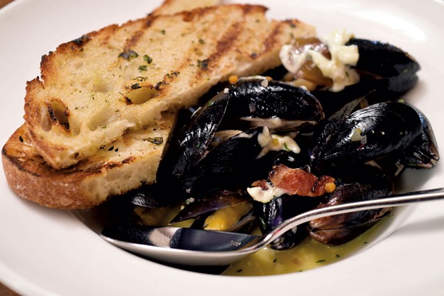 Cider-steamed mussels with grilled bread, smoked bacon and aioli - JEB WALLACE-BRODEUR