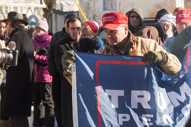 Bagpipes, Speeches and Drive-By Protesters Mark the Raising of New Trump Flag