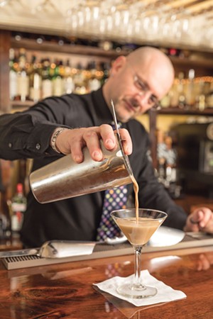 Head server Thomas Meek makes an Espresso Martini. - OLIVER PARINI