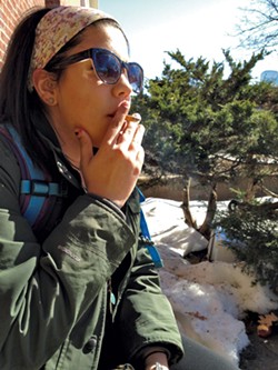 UVM student Haley Agront took a smoke break earlier this year. - MOLLY WALSH
